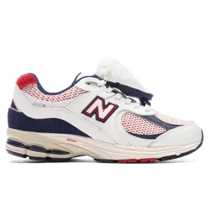 2002R - Sea Salt/Team Red New Balance shoes for walking and running