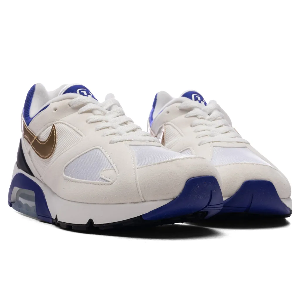 Air 180 - Summit White/Metallic Gold/Concord Nike Bold Logo Sneakers
