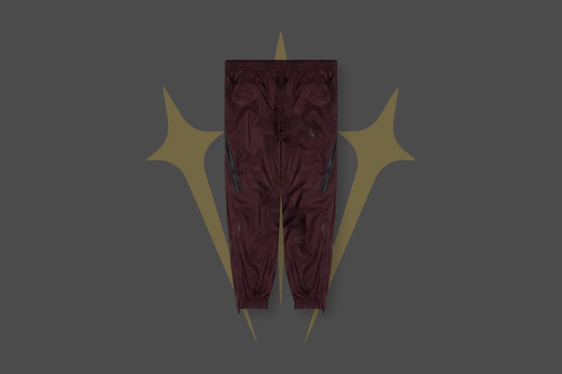 NRG Nocta Track Pant DR - Dark Wine/Black Nike trainers with responsive foam