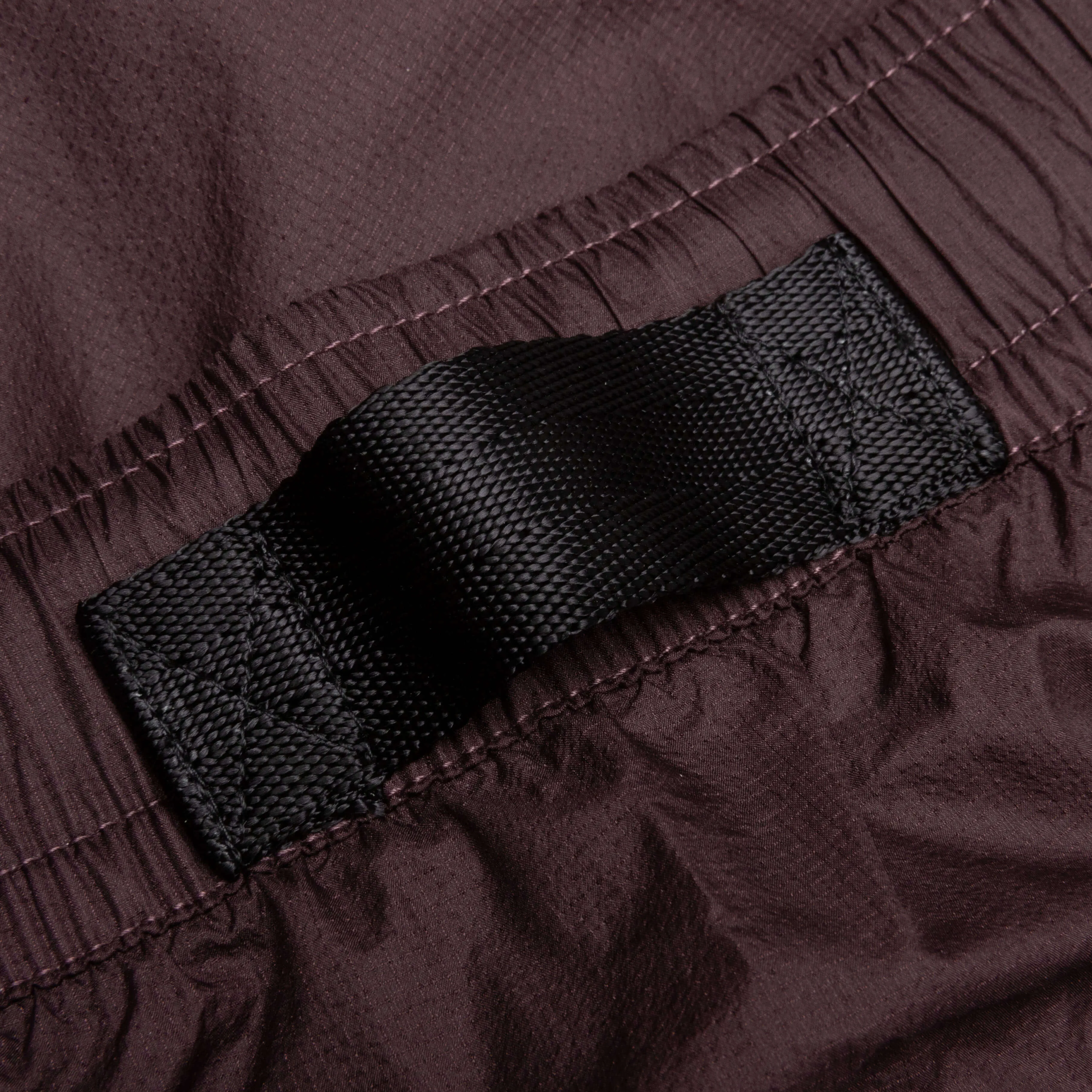 NRG Nocta Track Pant DR - Dark Wine/Black Nike trainers with responsive foam