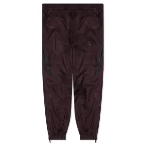 NRG Nocta Track Pant DR - Dark Wine/Black Nike signature design with comfort fit