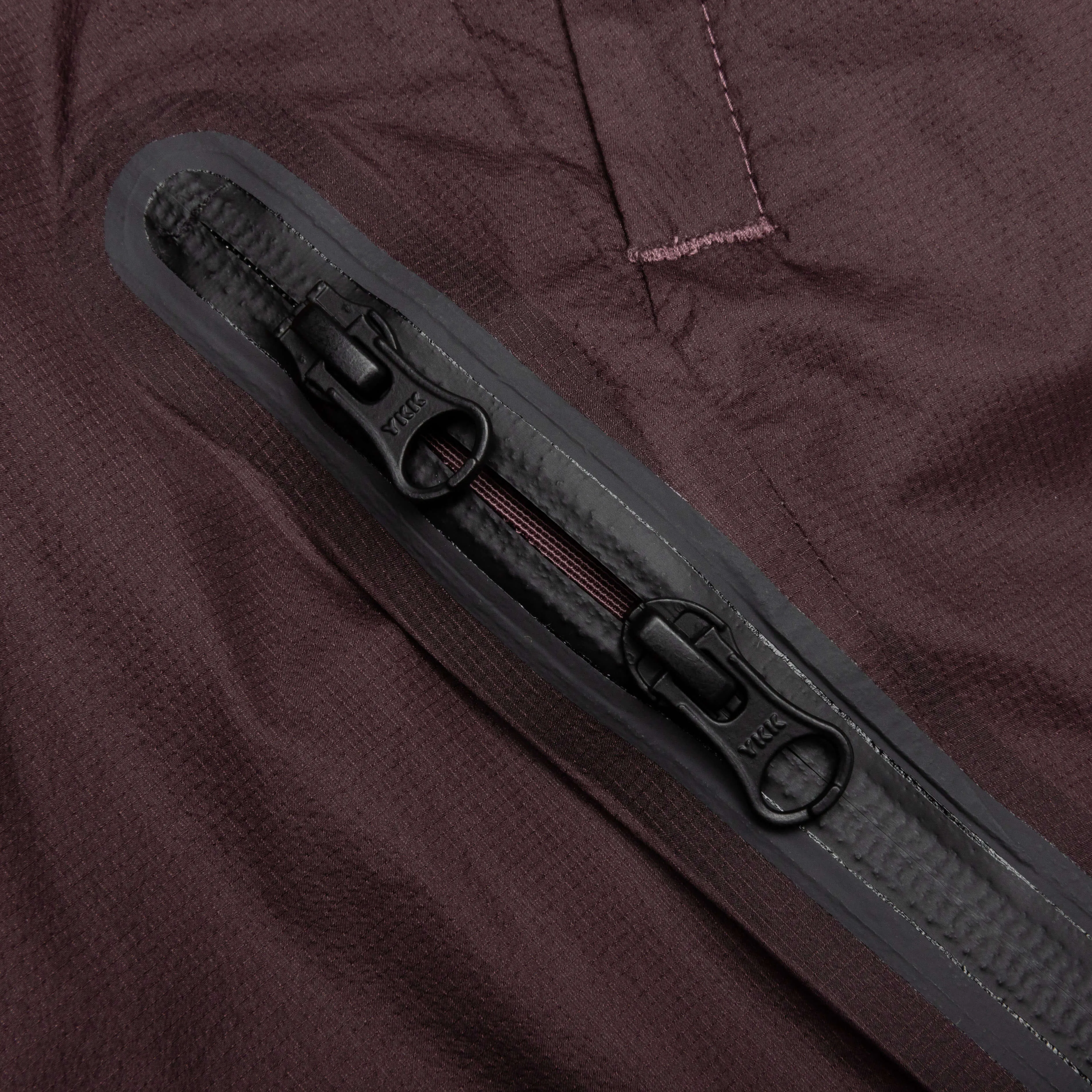 NRG Nocta Track Pant DR - Dark Wine/Black Nike trainers with responsive foam