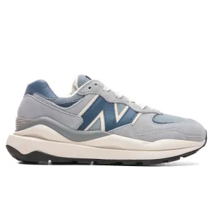 Women's 57/40 - Eclipse/Metallic Gold New Balance shoes for walking and running