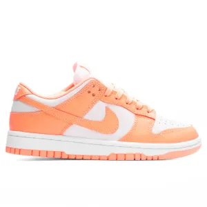 Women's Dunk Low - Peach Cream/White Nike fashion sneakers with bold branding