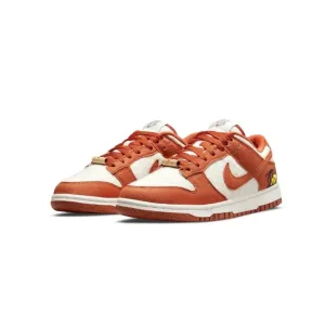 Women's Dunk Low Sun Club Burnt Sunrise Orange Sail Black Vivid Green Barn Sunrise Nike Dunk sneakers with classic silhouette