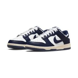 Women's Dunk Low White Navy Vintage Cream Nike Dunk sneakers with classic silhouette